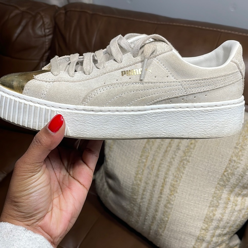 Gold toe PUMA sneakers